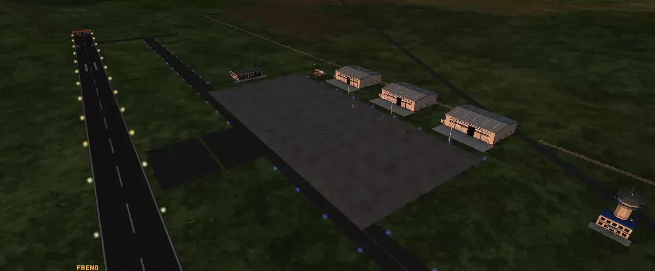 Aeródromo de noche con las luces de la pista encendidas