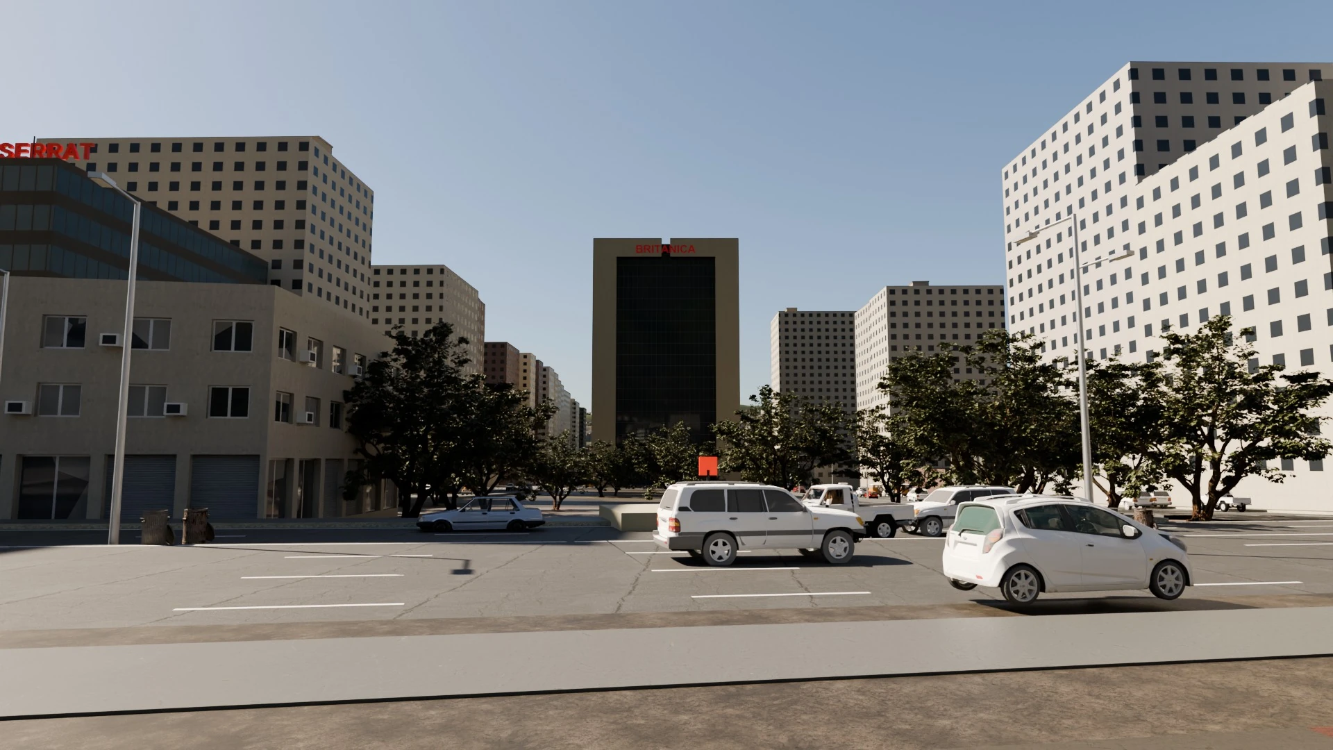 Avenida de Caracas con edificios y vehículos estacionados