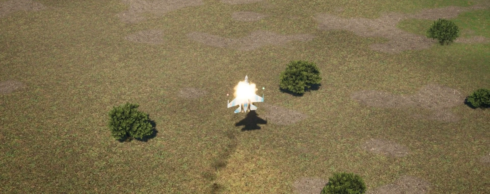 Hit airplane exploding over the ground, seen from above